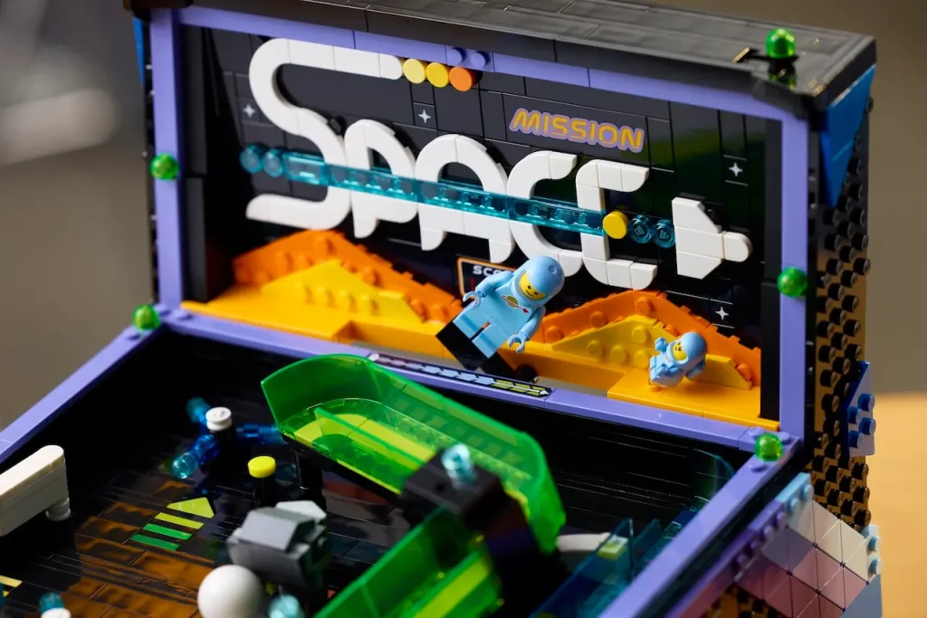 máquina de pinball de LEGO austronauta bebe
